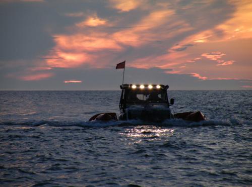 Amphibious LWB land Rover at sea on Cape to Cape special project