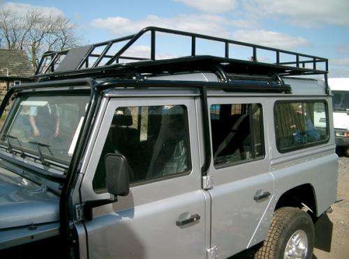 Land Rover Defender external roll cage and roof rack
